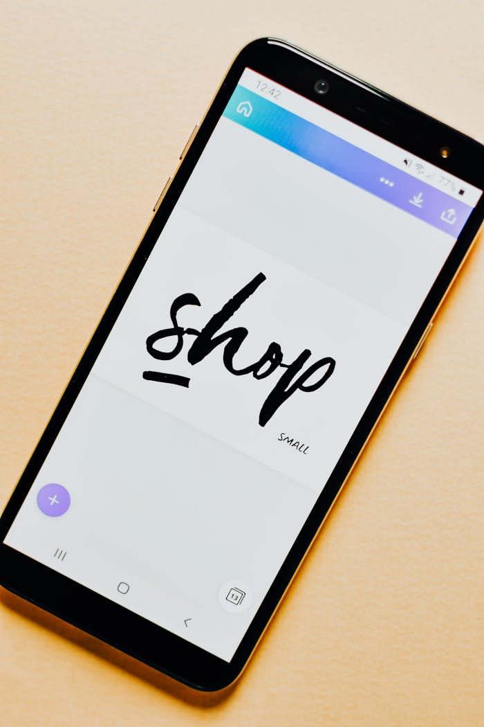 Home Close-up of a smartphone screen with a 'Shop' application interface on a light background.